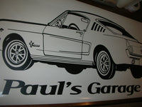 a picture of a car with the words paul's garage on it