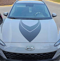 a silver sports car parked in a parking lot