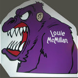 a purple sticker with a large monster's mouth