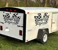 a trailer with a checkered flag painted on it